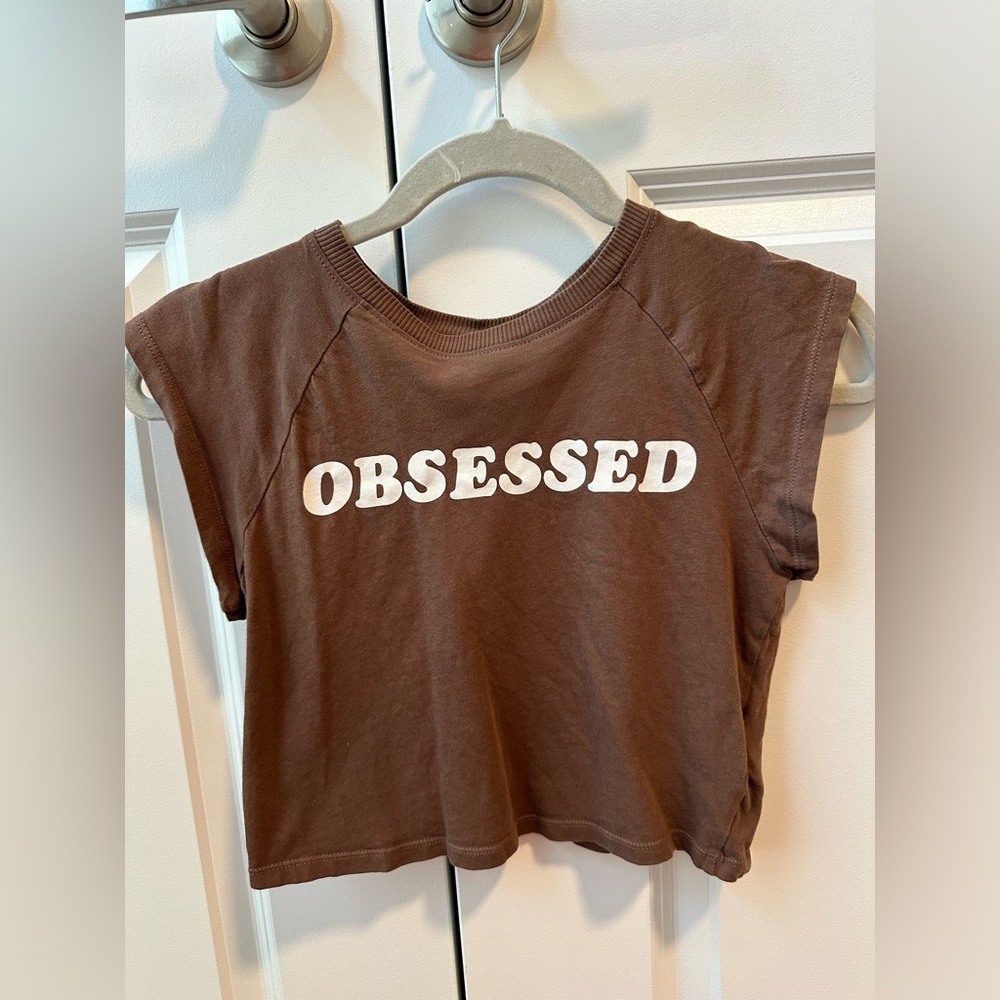 Brown baby tee shirt “obsessed” from H&M size xs.